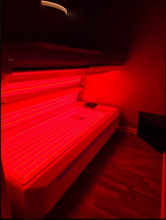 Full-body red light therapy bed at Sunsational Tan